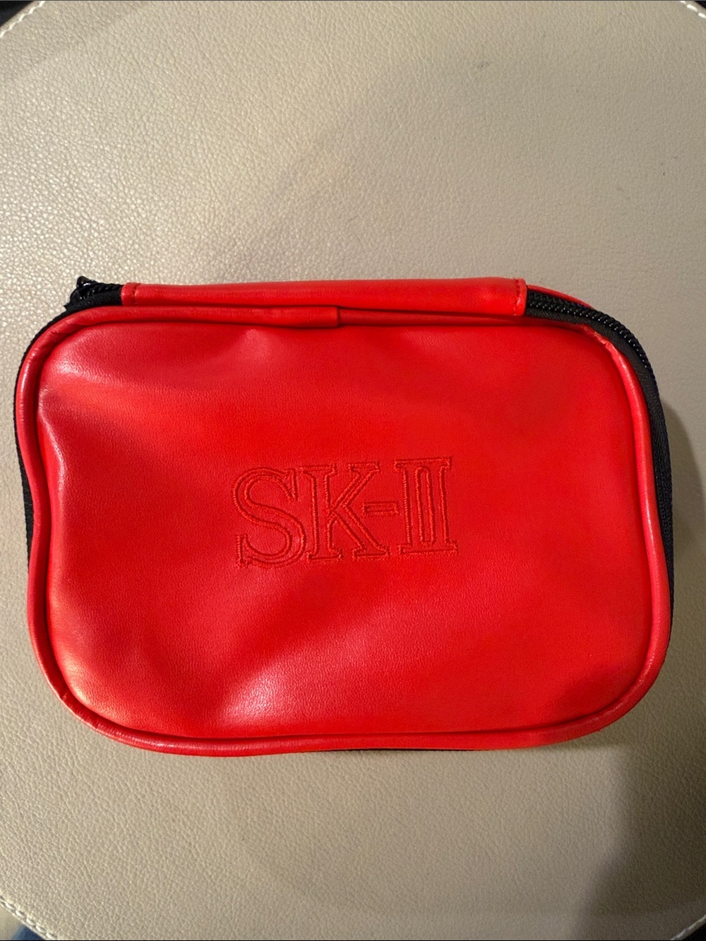 Red Cosmetic Pouch with Embossed Logo